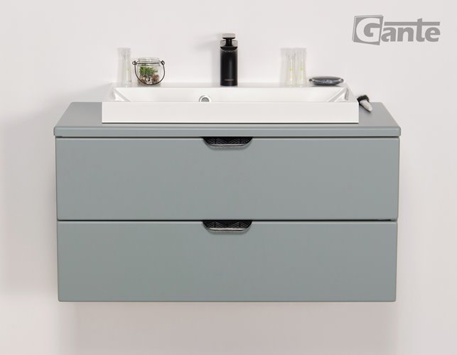 Miętowa szafka łazienkowa wisząca z białą umywalką nablatową czarny uchwyt 80 cm Magnolia