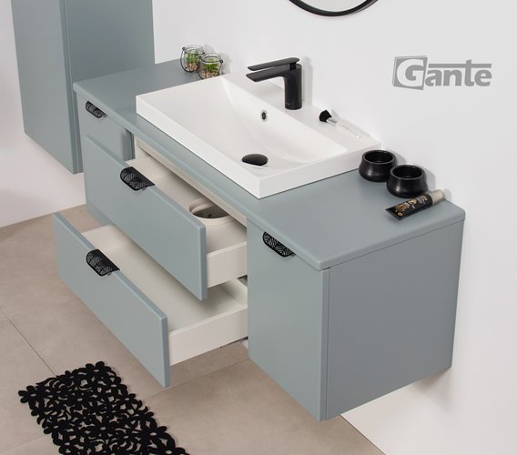 Miętowa szafka łazienkowa wisząca z białą umywalką nablatową czarny uchwyt 120 cm Magnolia