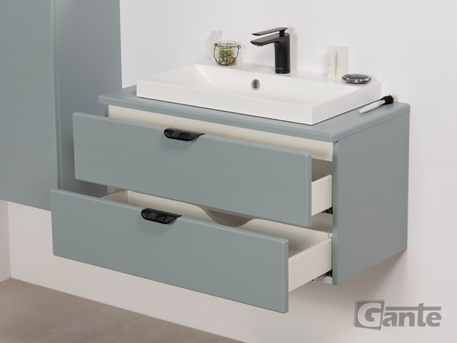 Miętowa szafka łazienkowa wisząca z białą umywalką nablatową czarny uchwyt 80 cm Magnolia