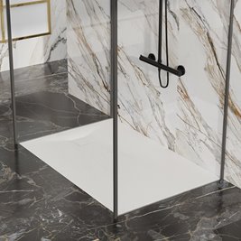 Biały brodzik prysznicowy prostokątny o strukturze kamienia 130x80 cm Riko Hydrosan