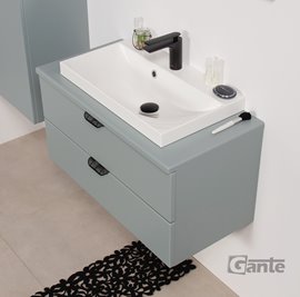 Miętowa szafka łazienkowa wisząca z białą umywalką nablatową czarny uchwyt 80 cm Magnolia