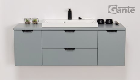 Miętowa szafka łazienkowa wisząca z białą umywalką nablatową czarny uchwyt 120 cm Magnolia