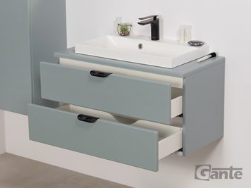 Miętowa szafka łazienkowa wisząca z białą umywalką nablatową czarny uchwyt 80 cm Magnolia